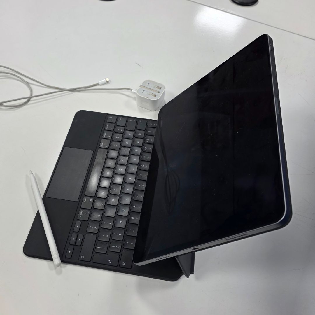 Apple iPad Pro with Magic Keyboard and Apple Pencil
