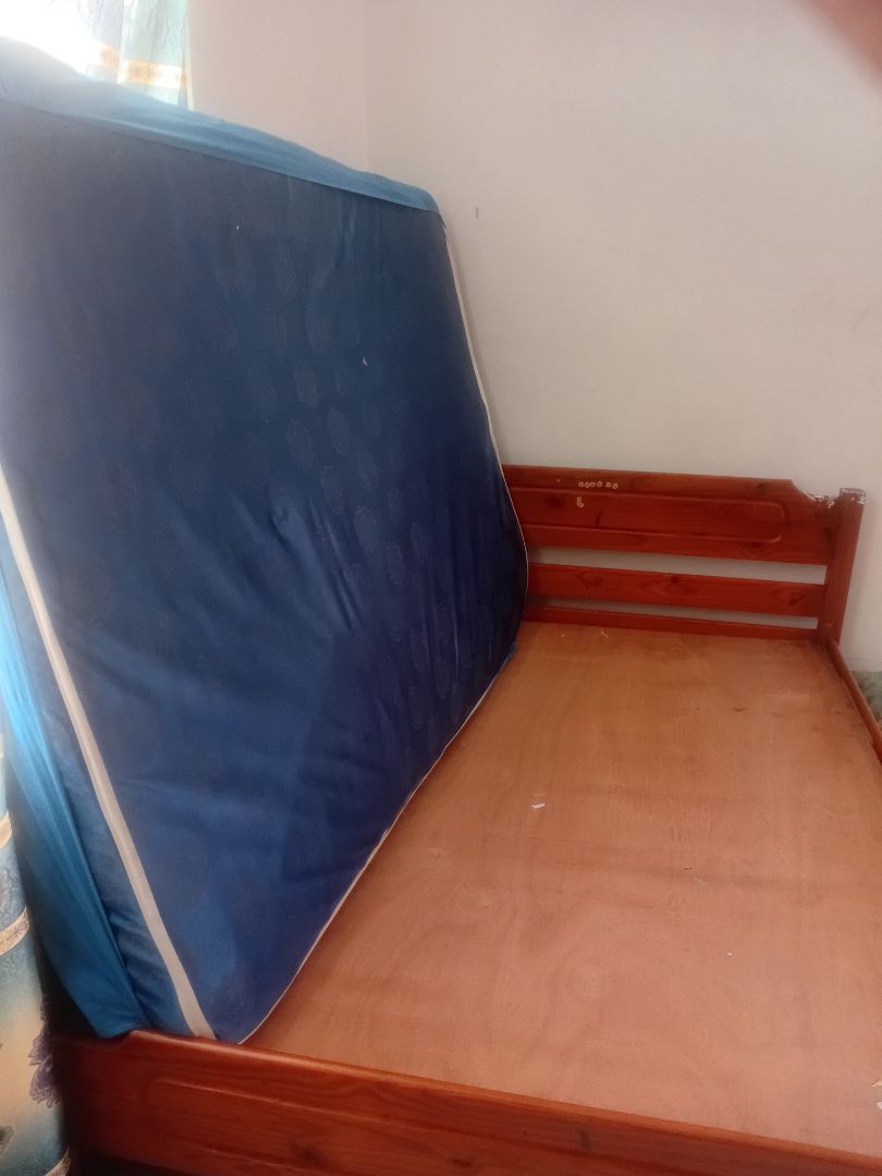 Wooden Bed Frame with Blue Mattress thumbnail 2