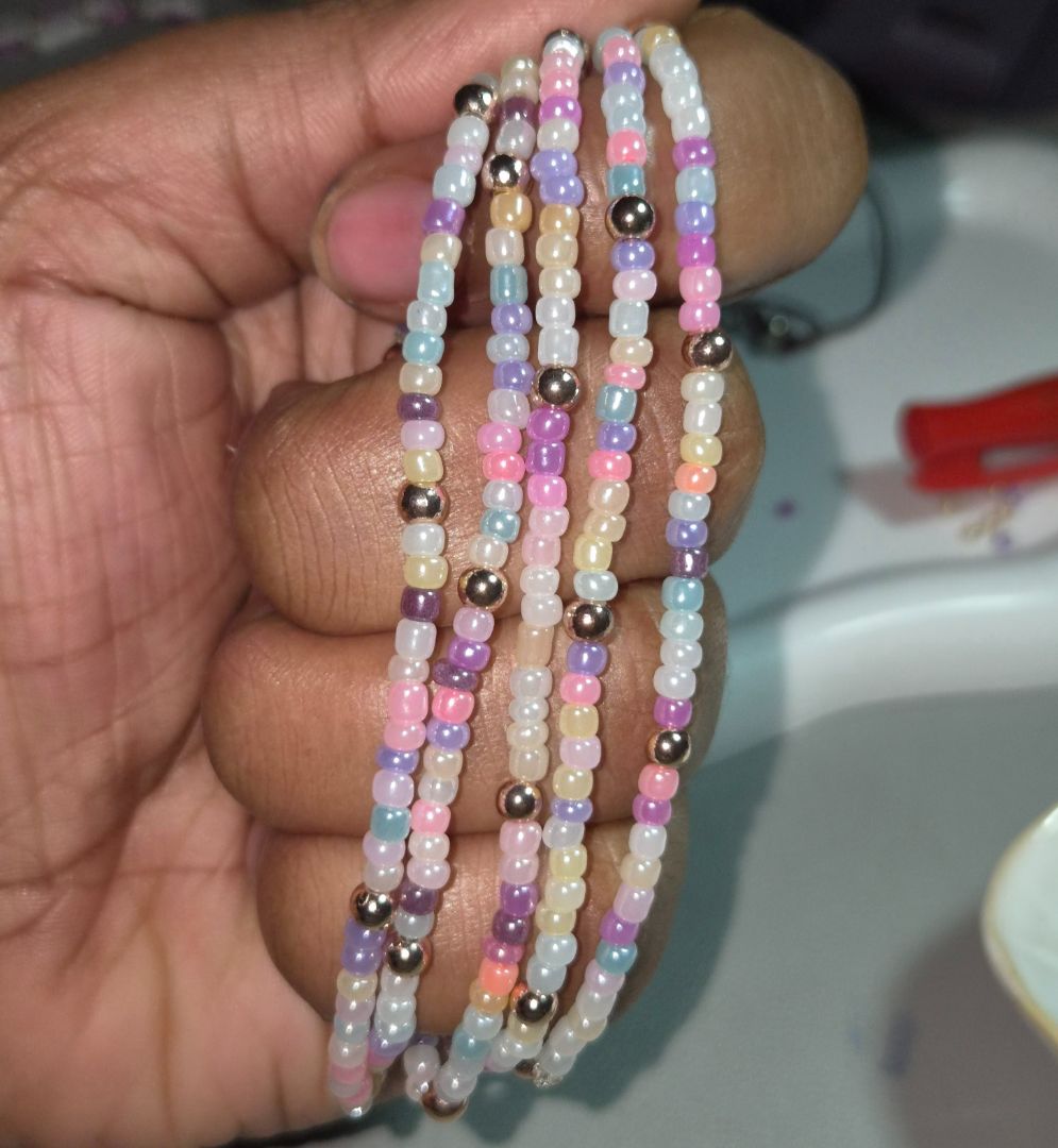 Handmade Pastel Beaded Bracelets with Metallic Accents