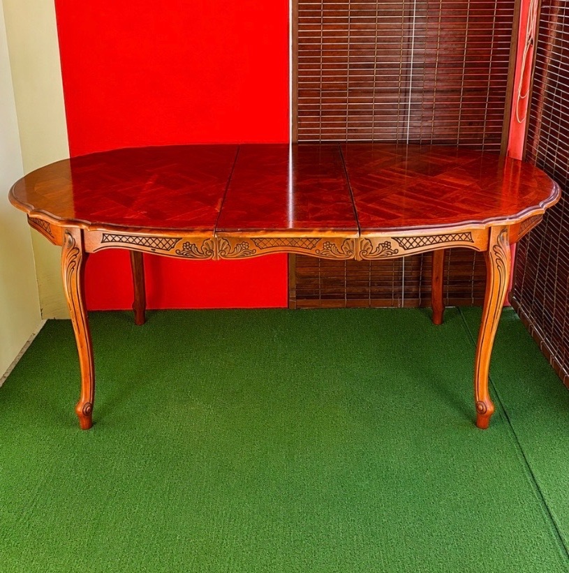 Extendable Wooden Dining Table with Carved Details