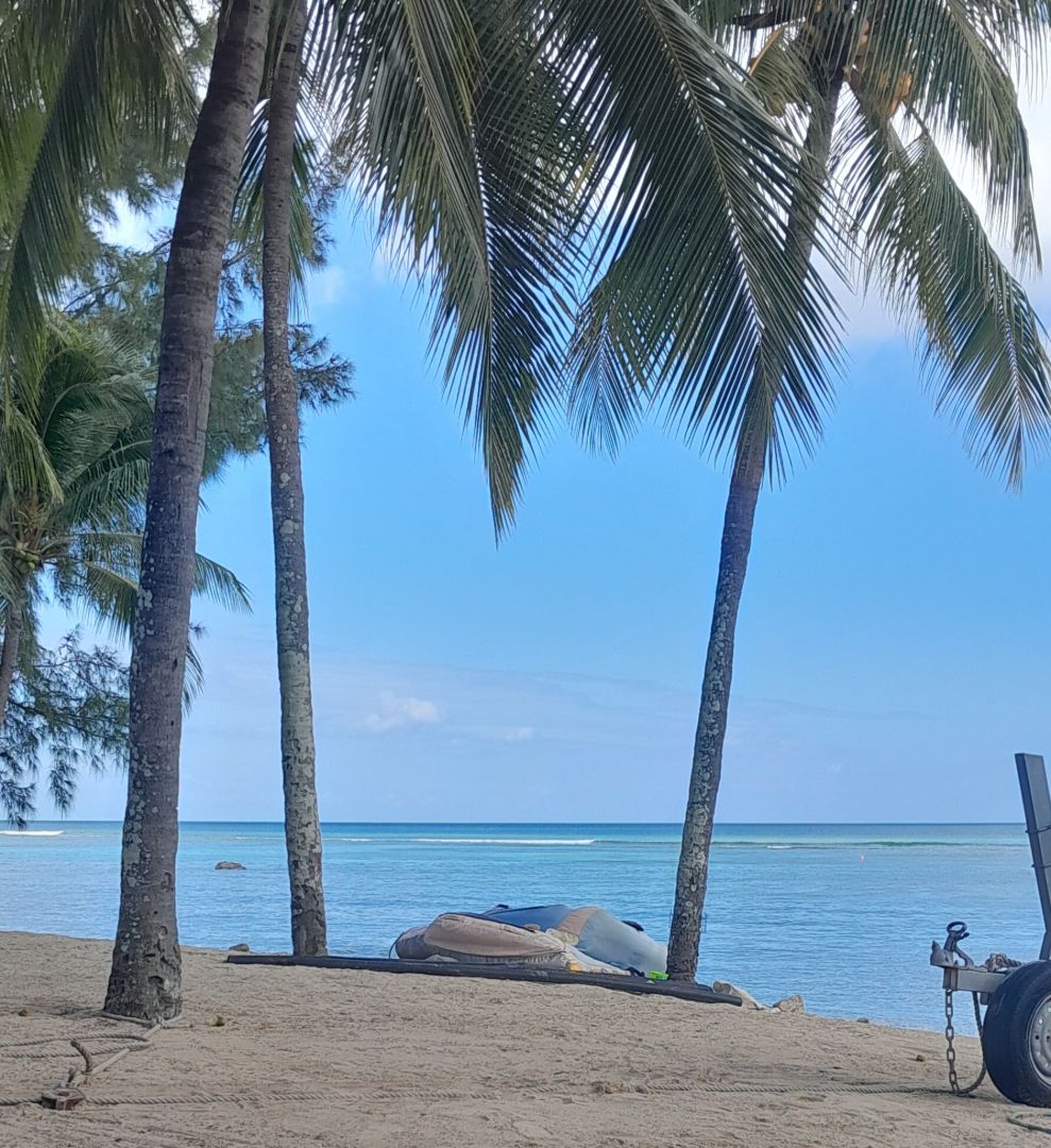 Inflatable Boat with Trailer on Beach